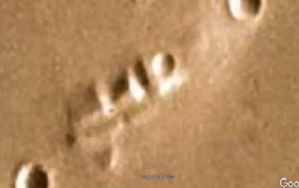 Российский исследователь Валентин Дегтерев нашел на фото с Марса 